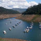Houseboats sit in the drought-lowered waters of Lake Oroville, near Oroville, California.